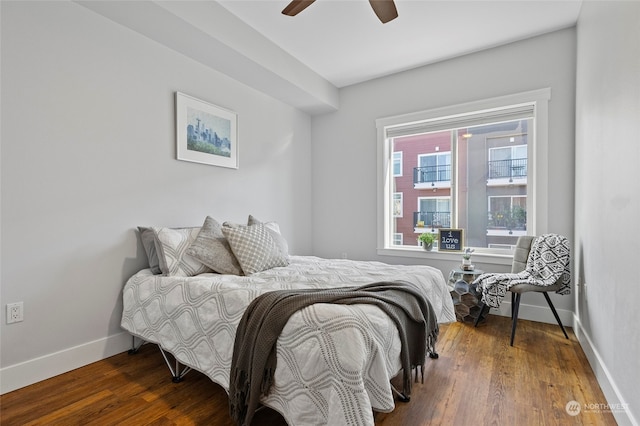 bedroom featuring dark hardwood / wood-style floors and ceiling fan