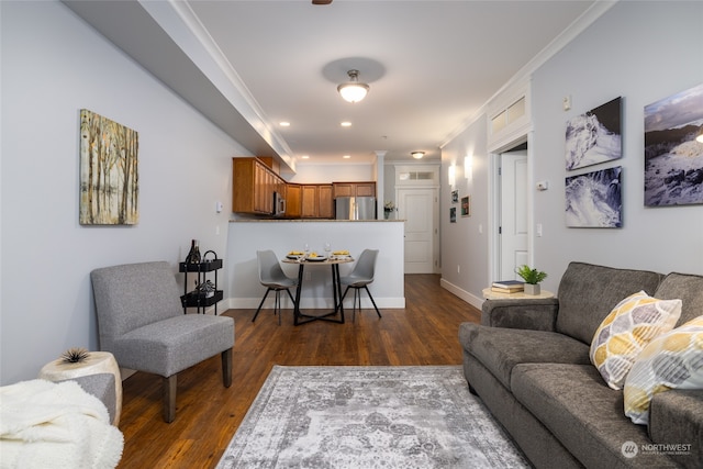 living room with crown molding and dark hardwood / wood-style floors