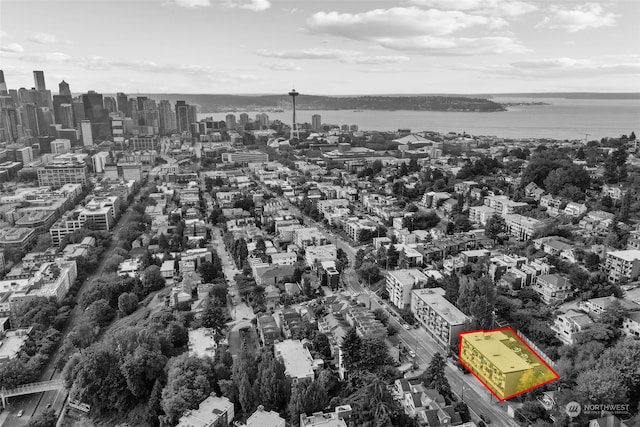 birds eye view of property featuring a water view