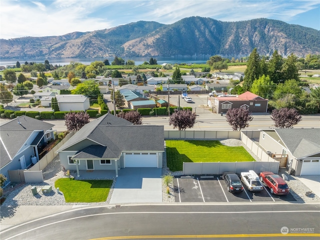 drone / aerial view featuring a mountain view