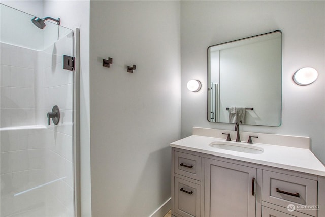 bathroom with vanity and walk in shower