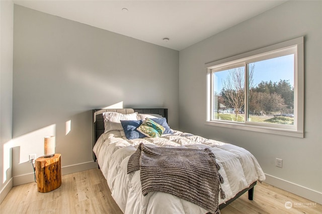 bedroom featuring light hardwood / wood-style floors