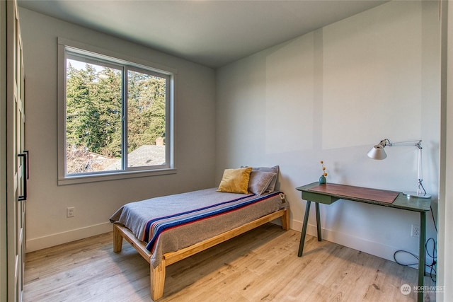 bedroom featuring light hardwood / wood-style flooring