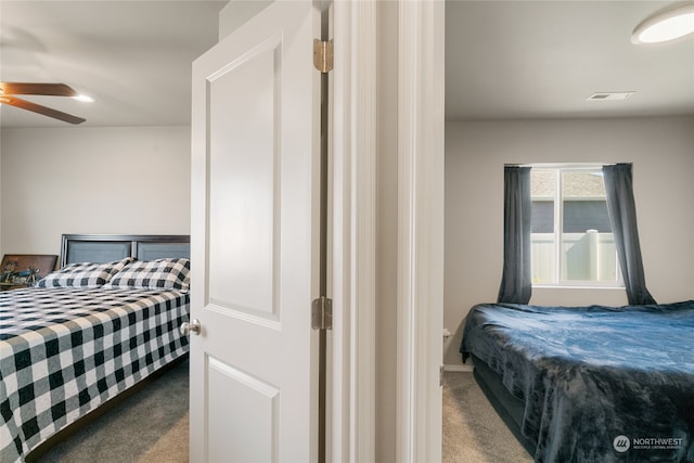 bedroom featuring carpet and ceiling fan