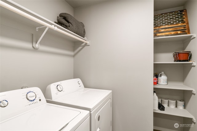 laundry room with washer and dryer