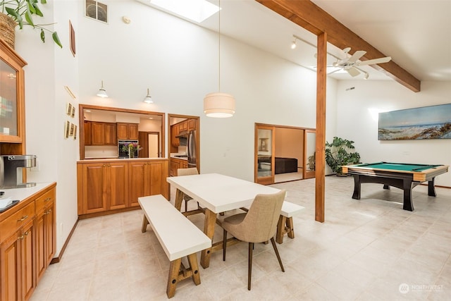 dining room featuring a ceiling fan, a skylight, billiards, visible vents, and beamed ceiling