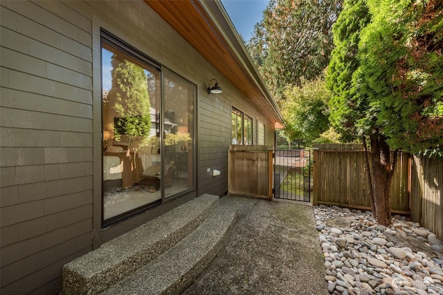 view of side of home with fence