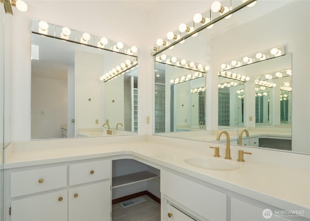 125 Arnold Palmer Pkwy, Sequim, WA 98382 - full bath with double vanity and tile patterned flooring