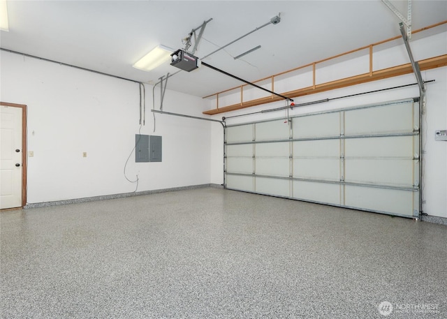 125 Arnold Palmer Pkwy, Sequim, WA 98382 - garage featuring a garage door opener and electric panel
