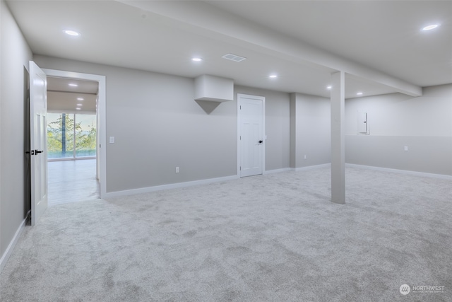 basement with light carpet