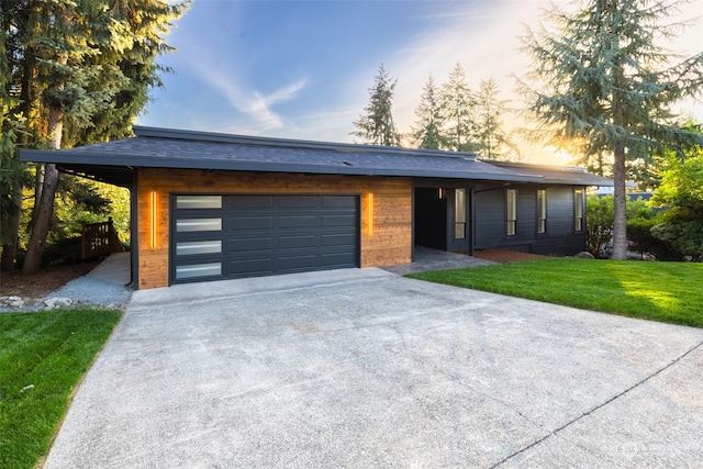 view of front of house with a lawn and a carport