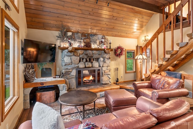 living room with wood-type flooring, wood ceiling, vaulted ceiling with beams, and a stone fireplace