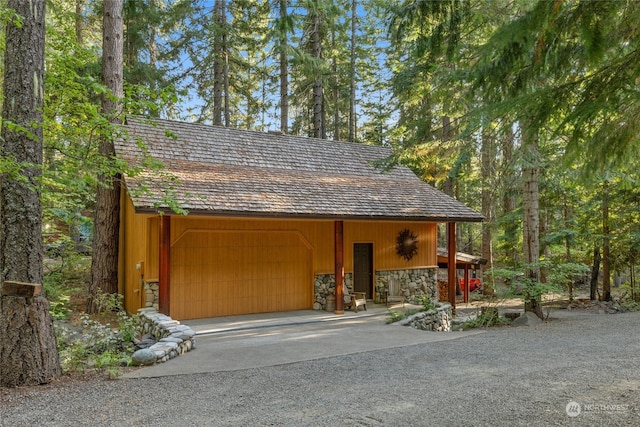 garage featuring driveway