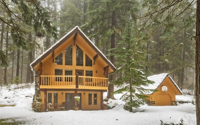 view of snow covered house