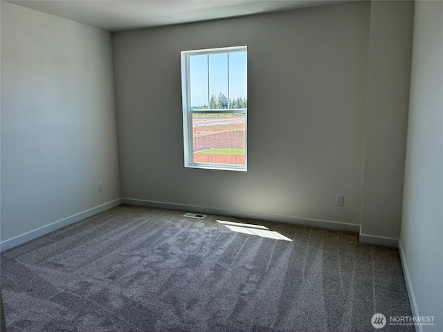 12707 172nd Avenue Ct E Unit 135, Bonney Lake, WA 98391 - carpeted empty room featuring baseboards