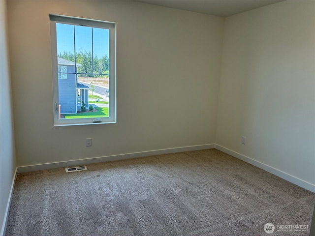 12707 172nd Avenue Ct E Unit 135, Bonney Lake, WA 98391 - carpeted spare room with baseboards