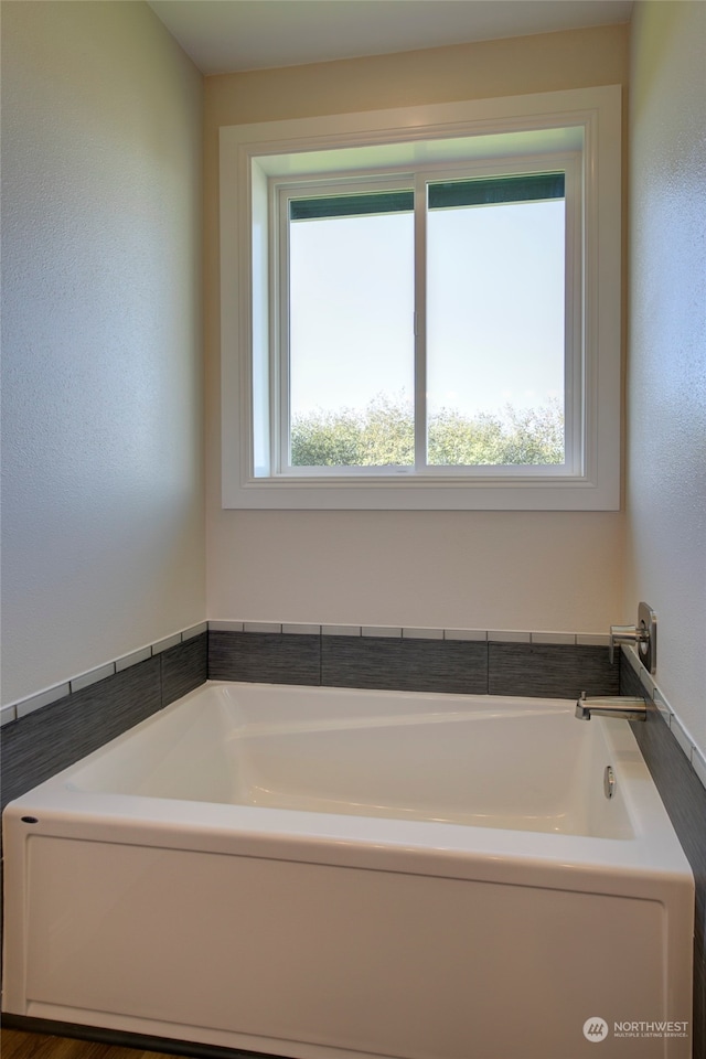 bathroom featuring a bathing tub