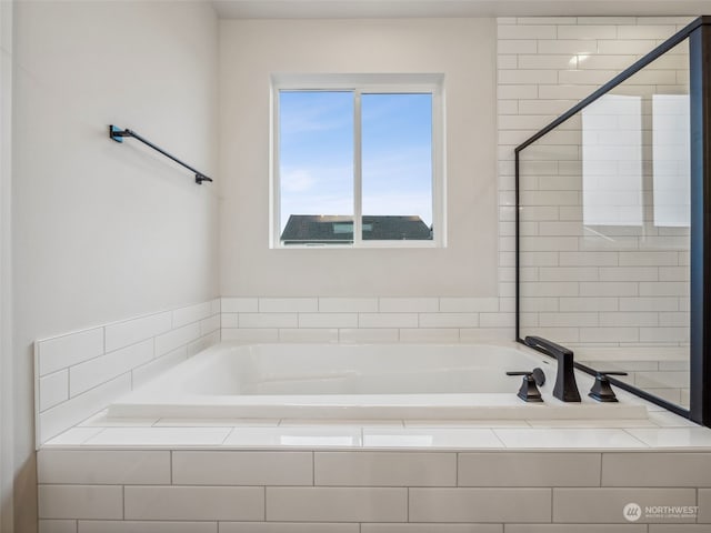 bathroom with independent shower and bath