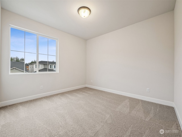 view of carpeted spare room