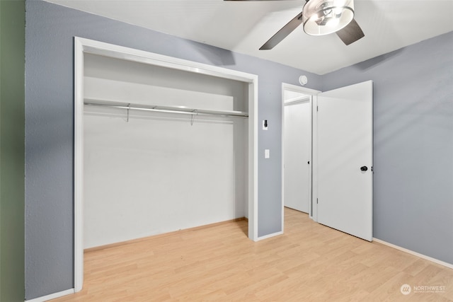 interior space featuring ceiling fan, a closet, and light hardwood / wood-style floors