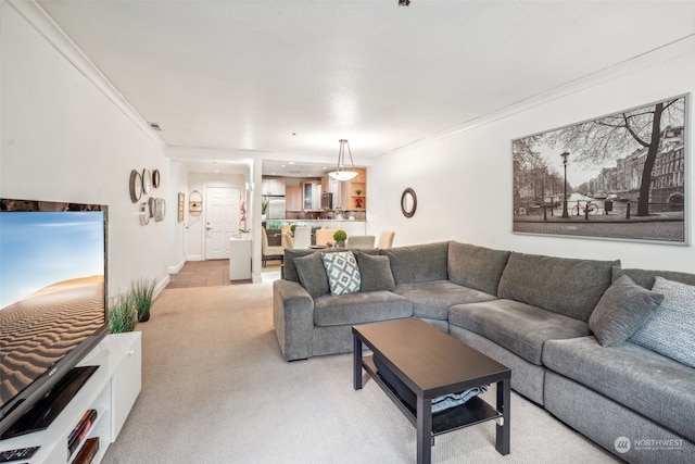 living room featuring crown molding and light colored carpet