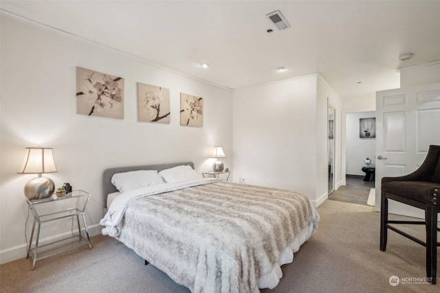 520 SE Columbia River Dr Unit 120, Vancouver, WA 98661 - carpeted bedroom featuring crown molding, visible vents, and baseboards