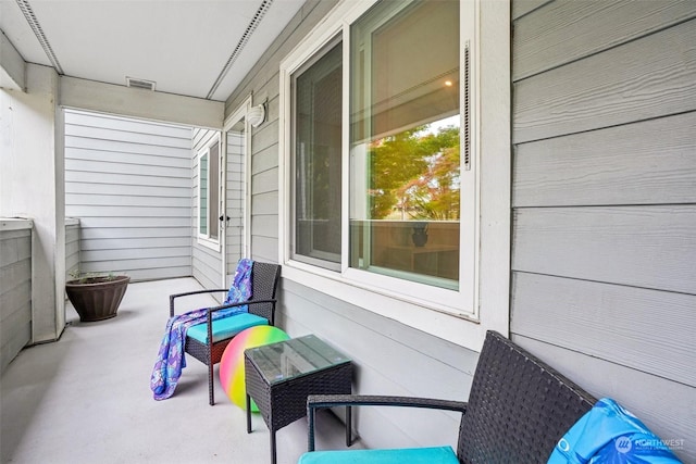 520 SE Columbia River Dr Unit 120, Vancouver, WA 98661 - balcony featuring a porch and visible vents