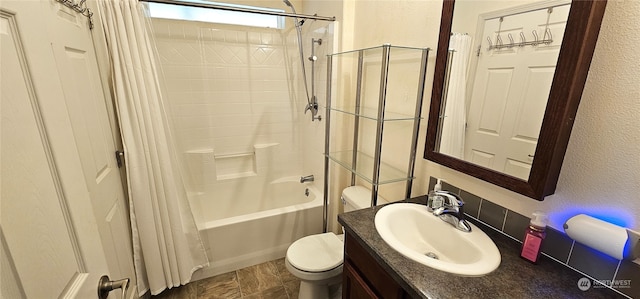 full bathroom featuring vanity, toilet, and shower / bathtub combination with curtain