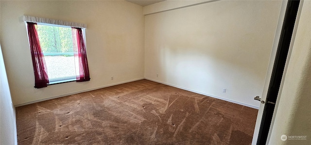 view of carpeted spare room