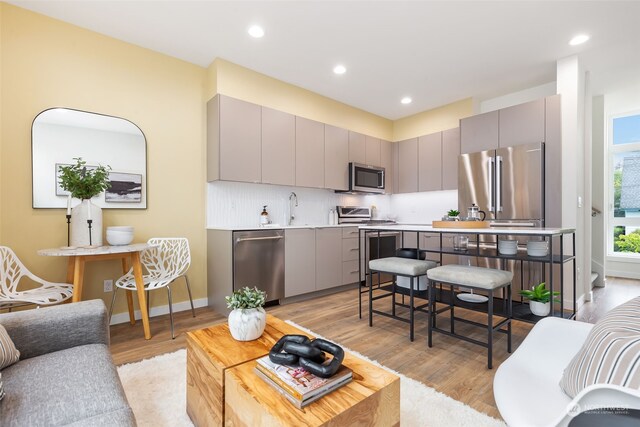 1325 NW 85th St, Seattle, WA 98117 - living room with light wood-type flooring and sink