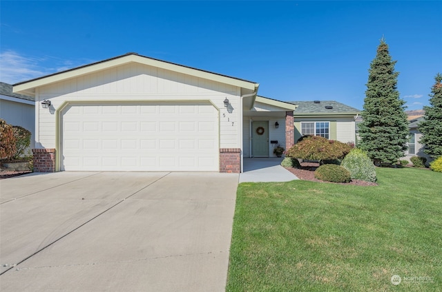 ranch-style house with a front lawn and a garage