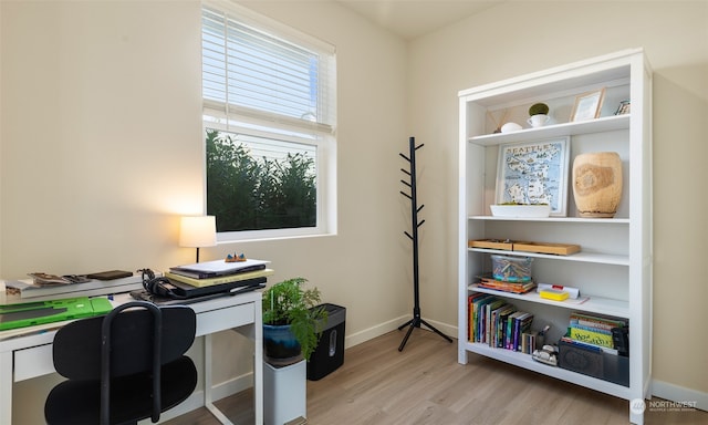 home office featuring light hardwood / wood-style flooring