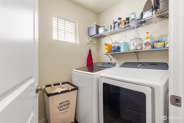 laundry area featuring washer and clothes dryer