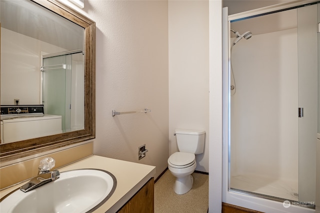 bathroom featuring an enclosed shower, vanity, and toilet