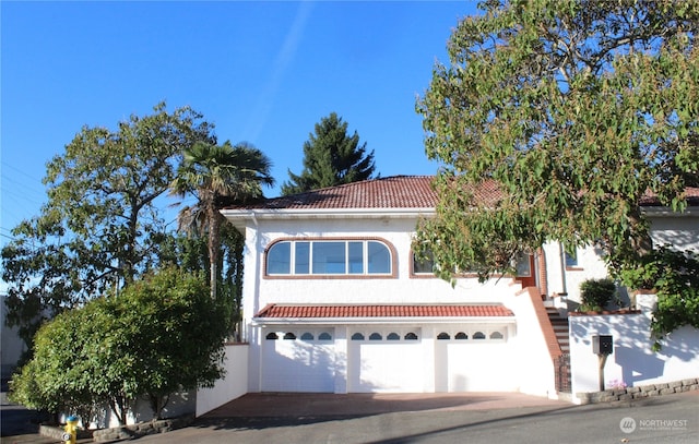 view of front of property with a garage