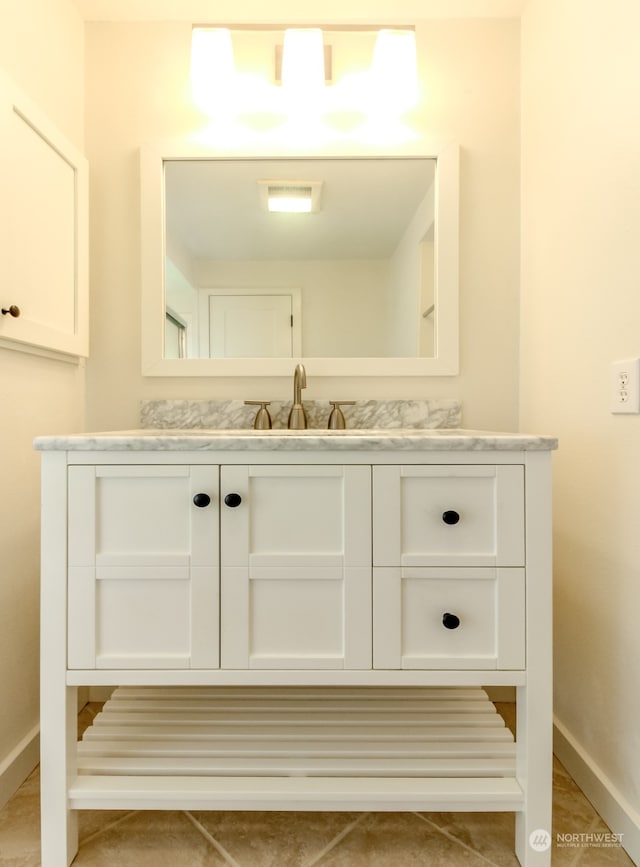 bathroom featuring vanity and tile patterned floors