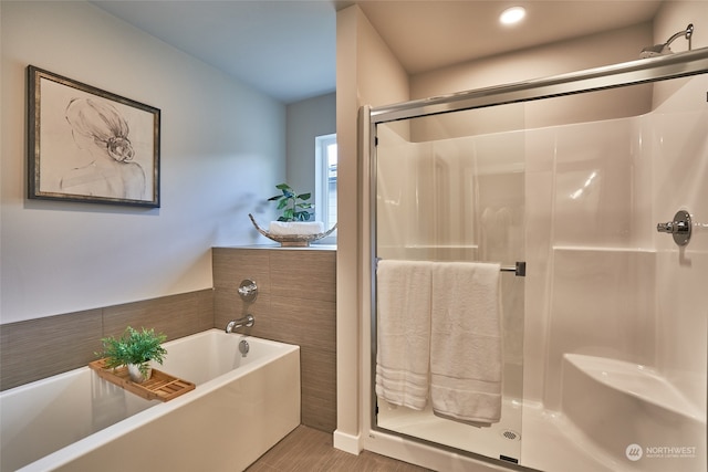 bathroom with independent shower and bath