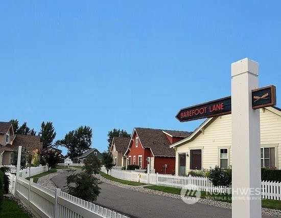 117 Barefoot Ln E, Oroville, WA 98844 - view of asphalt road with a residential view