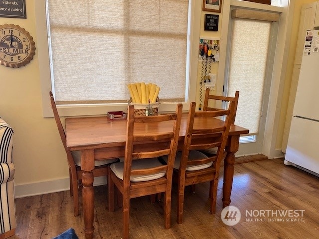 dining area featuring hardwood / wood-style floors