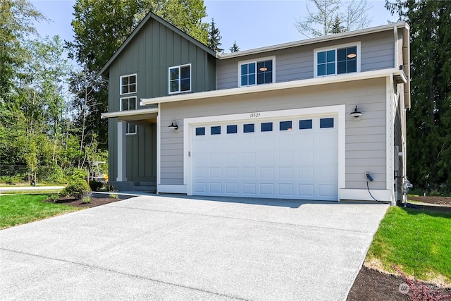 view of front of property with a garage