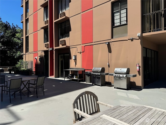 view of patio featuring a grill