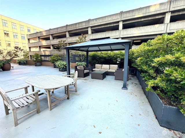 view of patio featuring a gazebo and outdoor lounge area