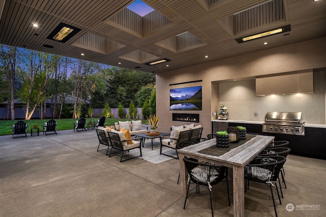 view of patio featuring area for grilling, an outdoor living space, and a grill