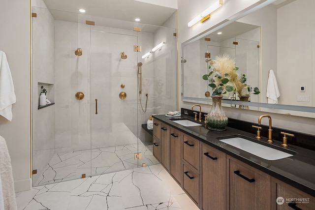 bathroom with vanity, tile patterned floors, and a shower with door