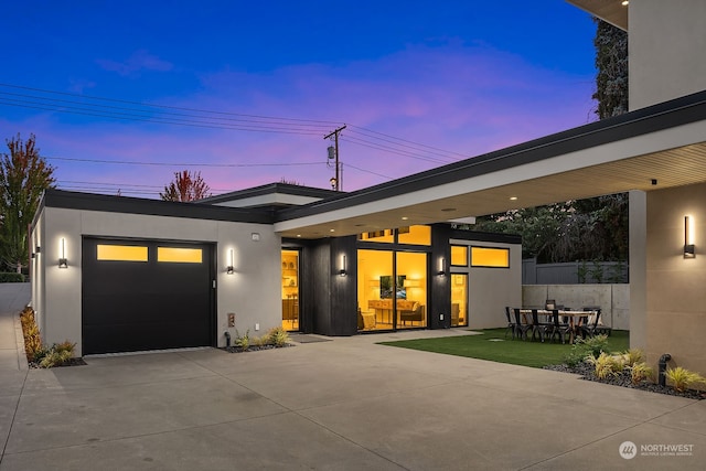 view of front of home with a garage