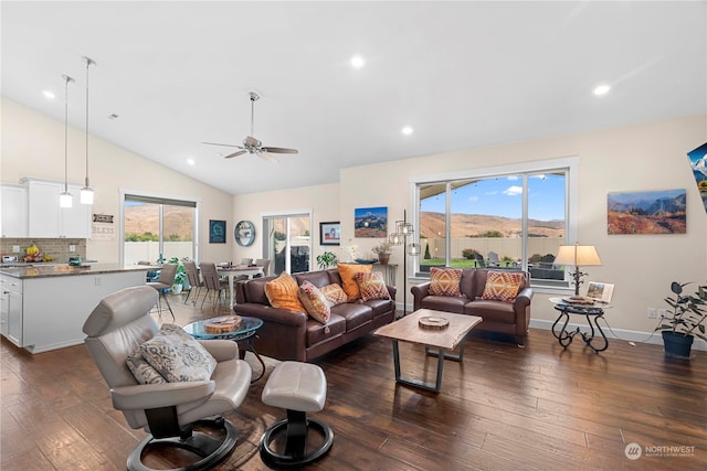 living room with dark wood-type flooring, baseboards, ceiling fan, lofted ceiling, and recessed lighting