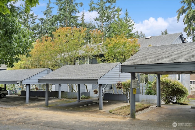 view of car parking featuring a carport