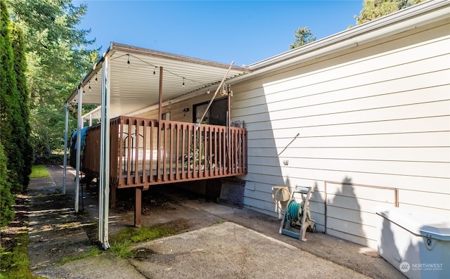 view of side of property with a deck