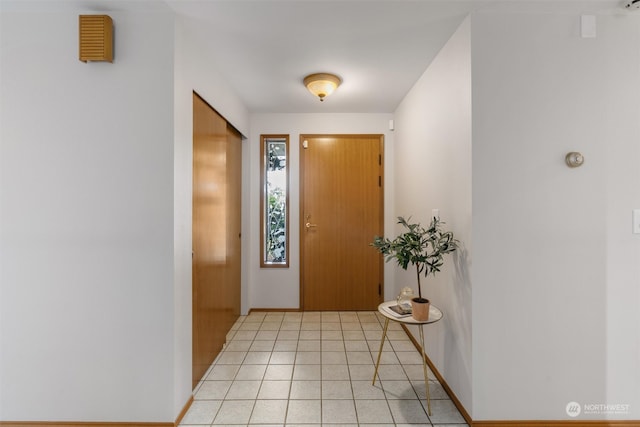 foyer entrance featuring light tile patterned floors