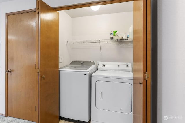 laundry area featuring separate washer and dryer